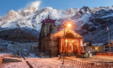 Kedarnath Temple with snow-covered Himalayan peaks during Char Dham Yatra in Uttarakhand